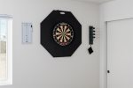 Dart board on the wall. Shoot straight